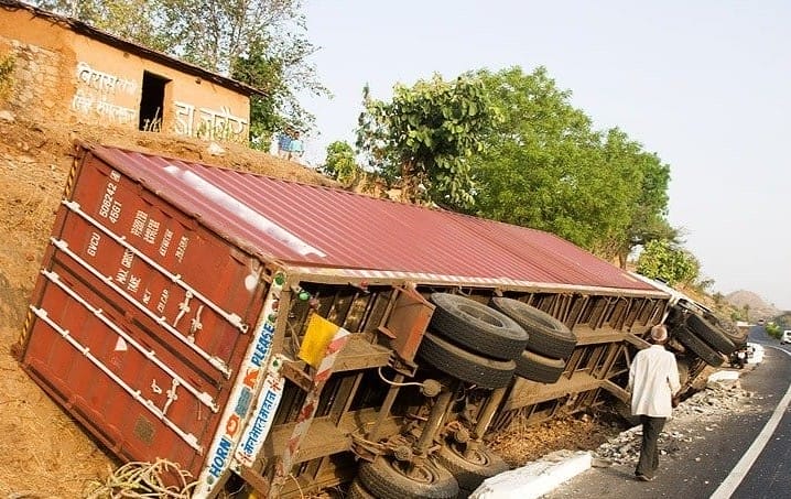 toppled container on truck